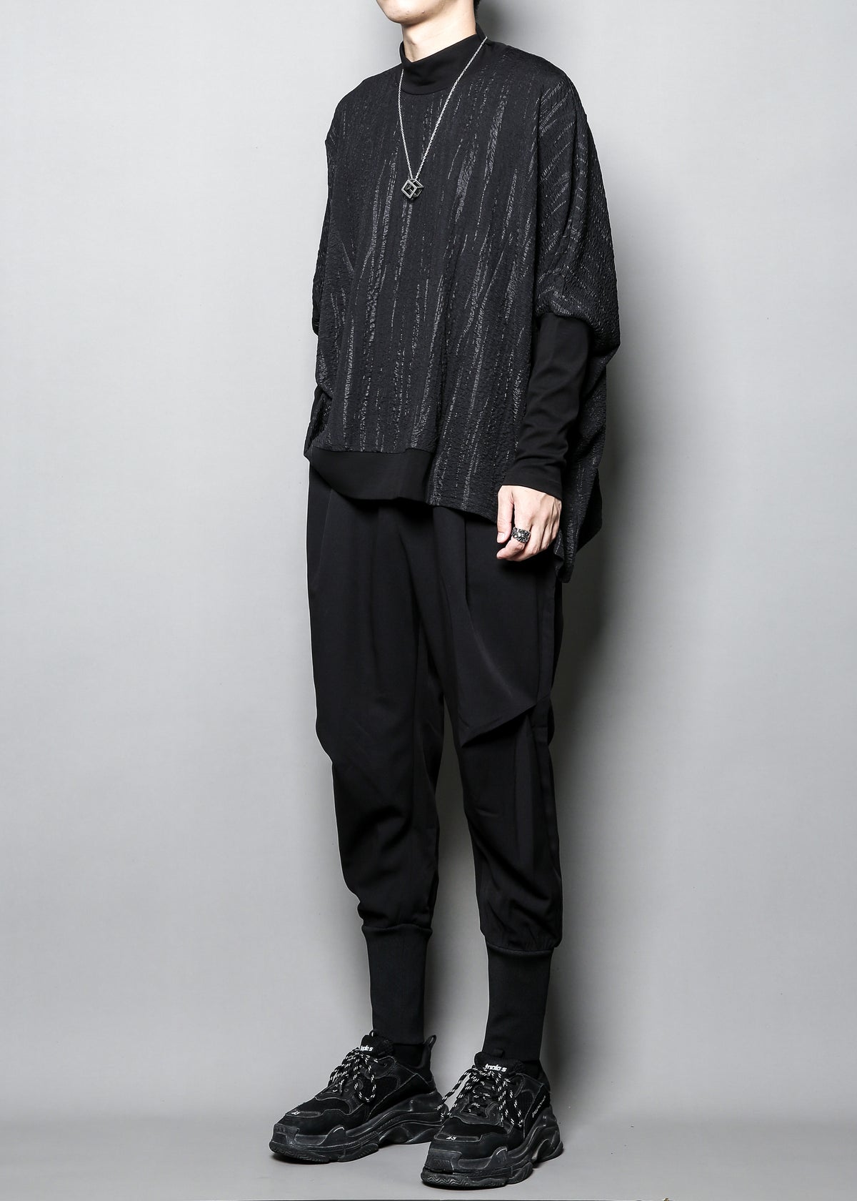The Geometric Drape Asymmetric Top